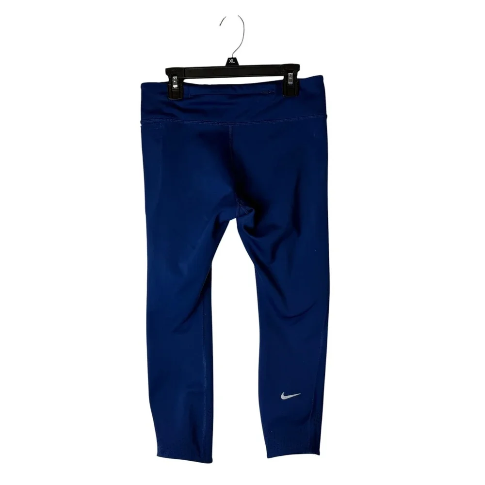 Nike Dri FIT Leggings Women Medium Blue Cropped Laser Cut Pockets‎ Athleisure
